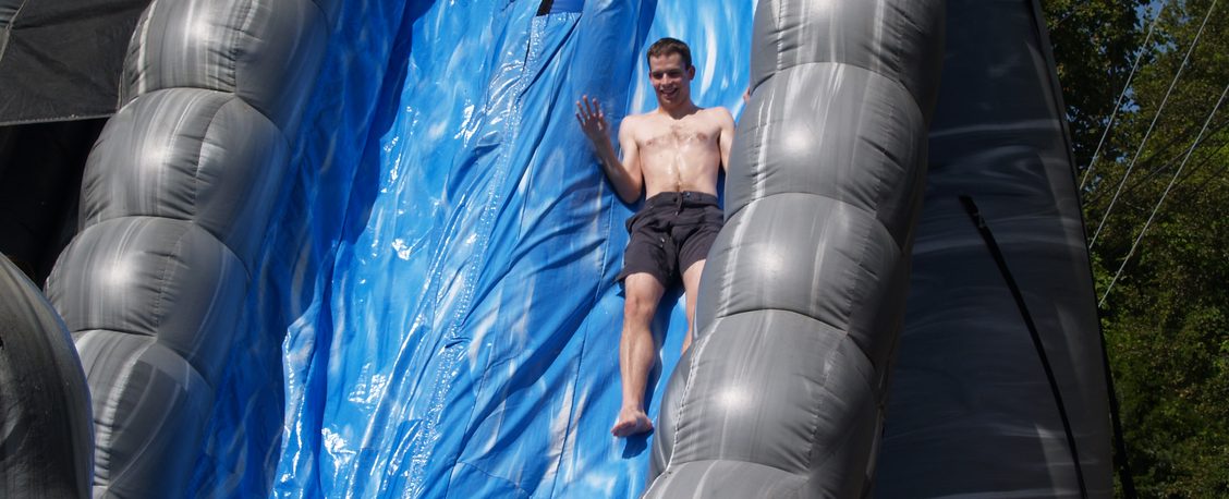 Person sliding down inflatable slide
